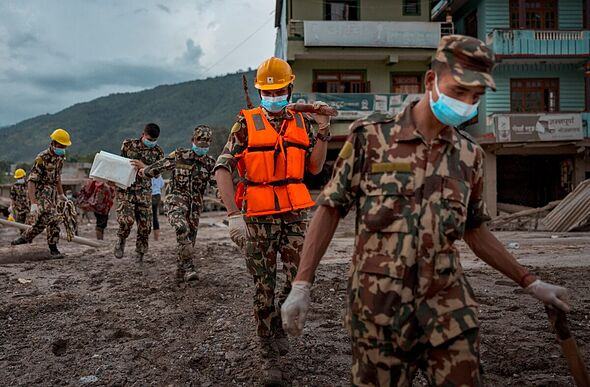 Headteacher's split-second decision saves 900 children from dying as 'school washed away'