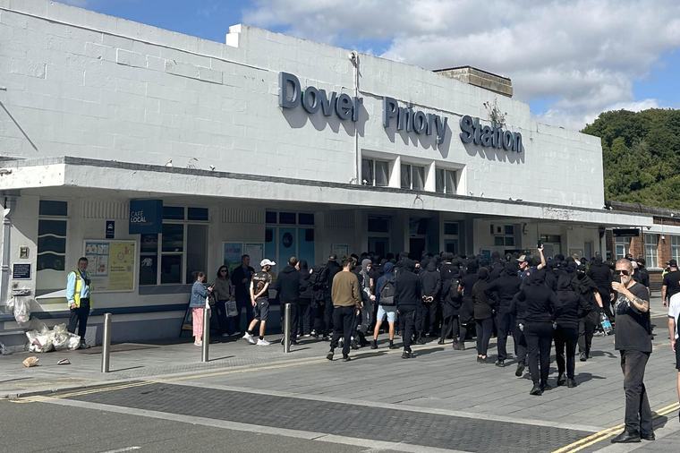 Black-clad masked ‘stop the boats’ protesters block roads in Dover