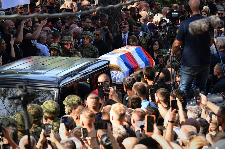 Crowds turn out as war criminal Mladic is buried with military honours