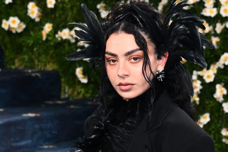 Heavy rain subsides as Charli XCX takes to stage at Reading Festival